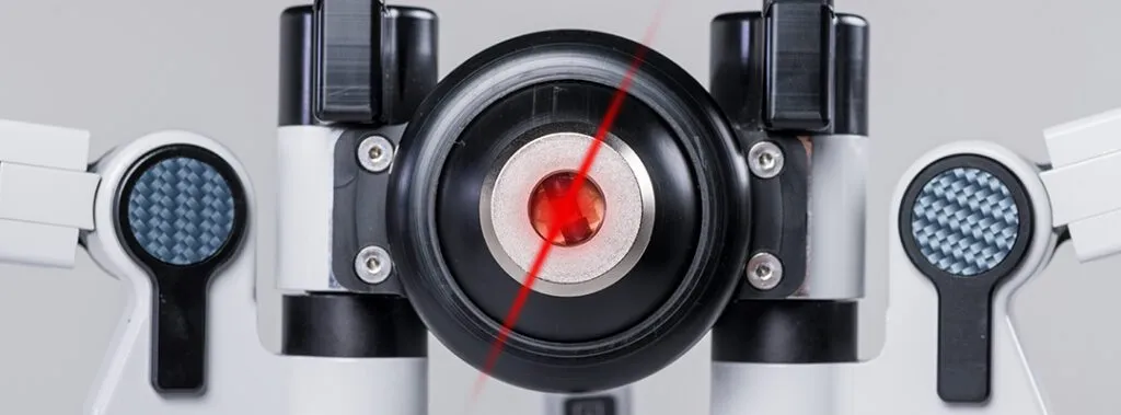 Erchonia FX 635 laser device in operation, emitting red therapeutic lasers for back pain treatment